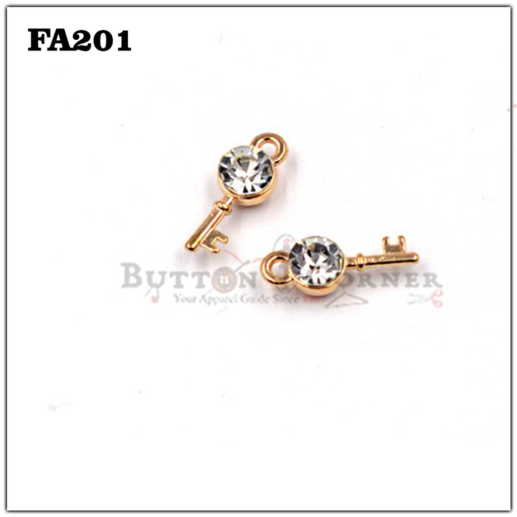 Key Shape With Stones Hanging